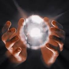 Hands cupped together holding a glowing white energy orb