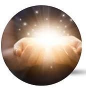 Hands cradling a radiant orb during an energy healing session